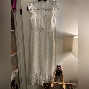 Women’s white lace midi dress with lining to chest and skirt. Never worn.